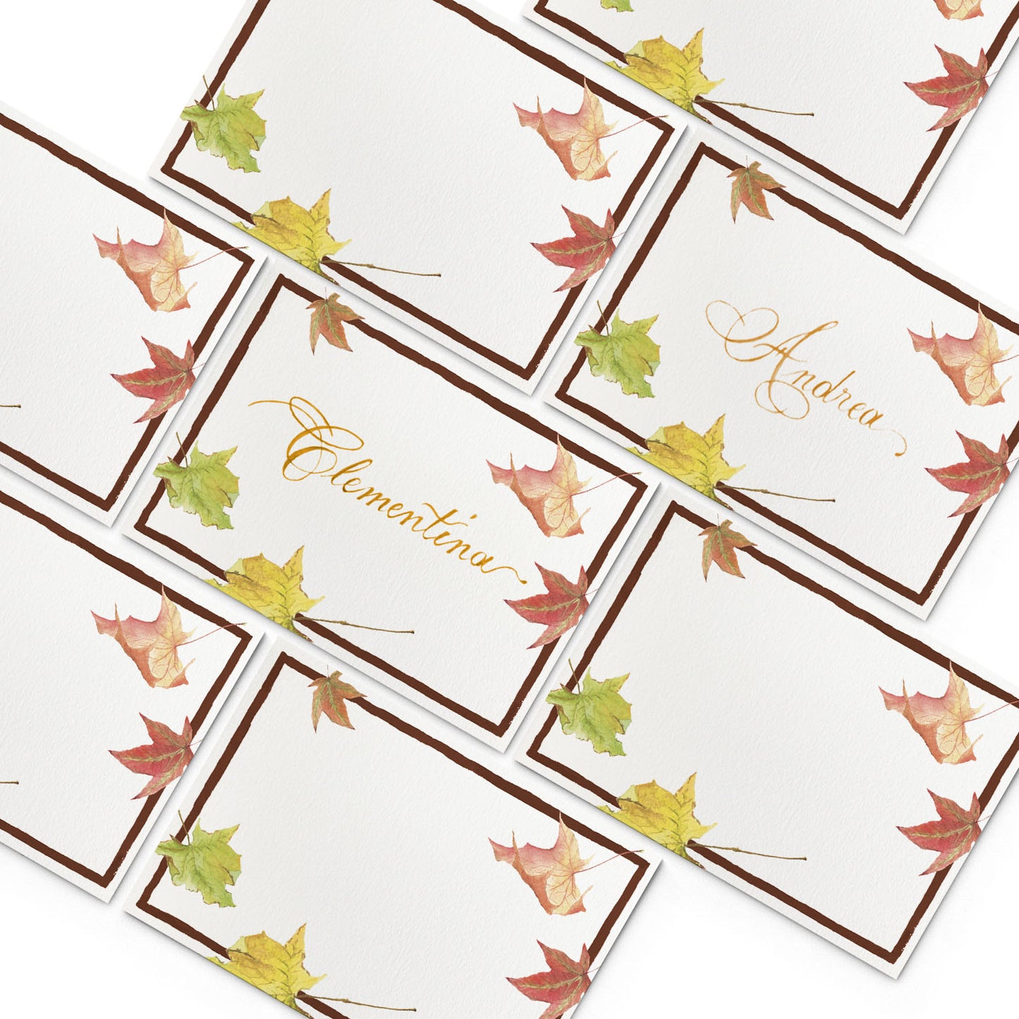 Image of multiple Clementina Sketchbook rustic place cards, featuring hand-painted designs of autumnal leaves.