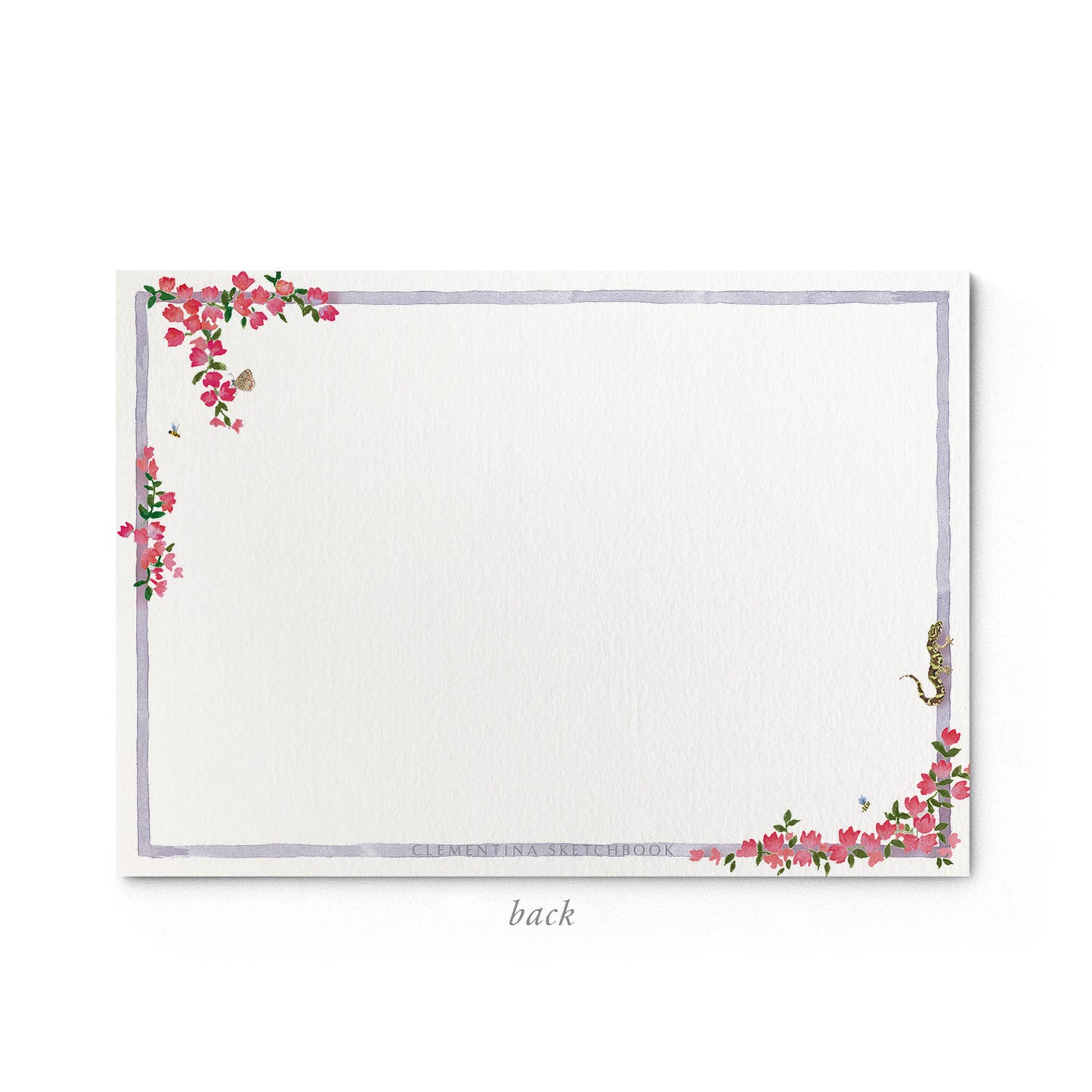 Image shows the back of a Clementina Sketchbook tropical stationery card, with floral watercolour design and a lilac border.