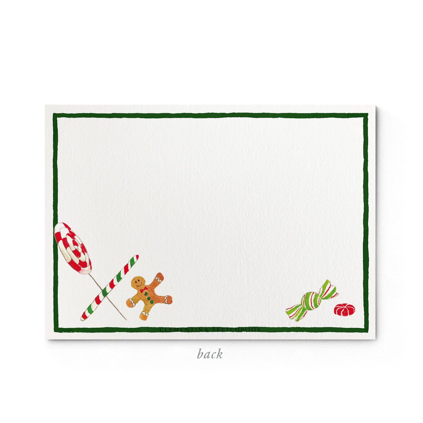 Image shows the back of a Clementina Sketchbook Christmas stationery card, with a candy cane watercolour design and a green border.