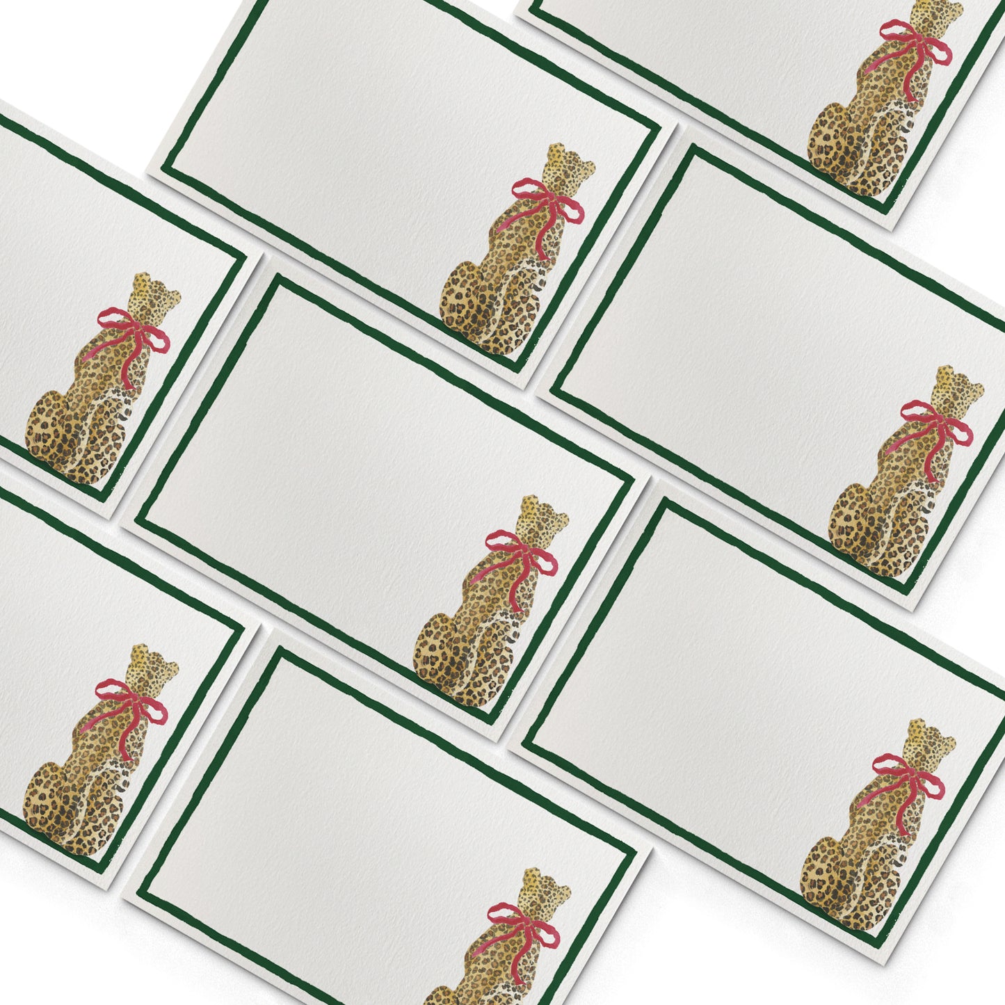 Image of numerous Clementina Sketchbook festive leopard mini personal stationery cards, organised into a pyramid shape.