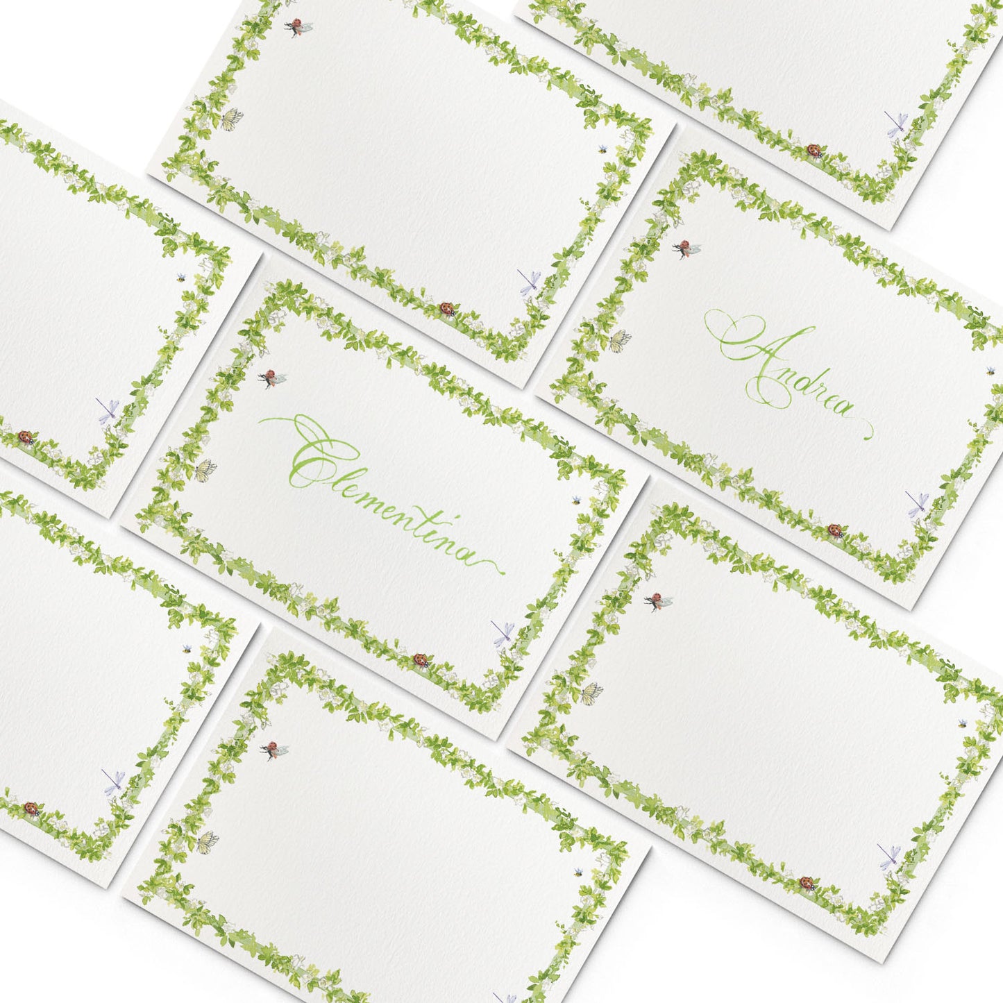 Image of multiple Clementina Sketchbook botanical place cards, featuring green borders and hand-painted designs of garden insects and leaves.