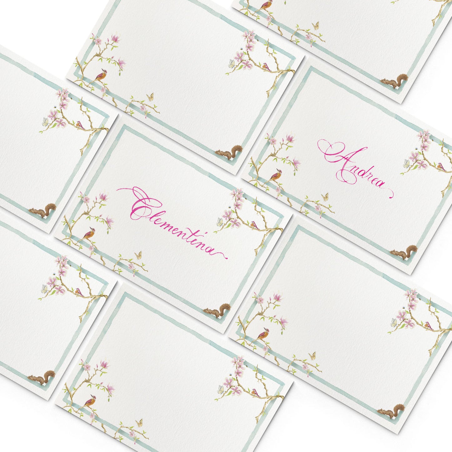 Image of multiple Clementina Sketchbook elegant place cards, featuring magnolia hand-painted designs.