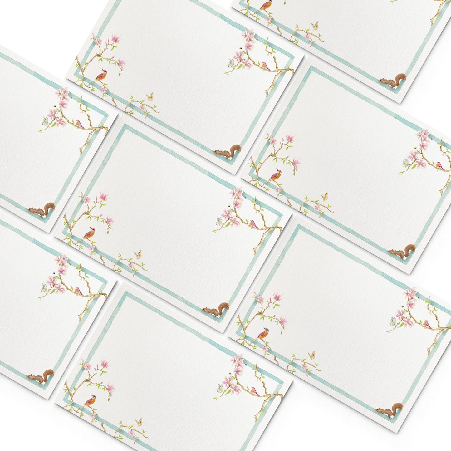 Image of numerous Clementina Sketchbook magnolia mini personal stationery cards, organised into a pyramid shape.