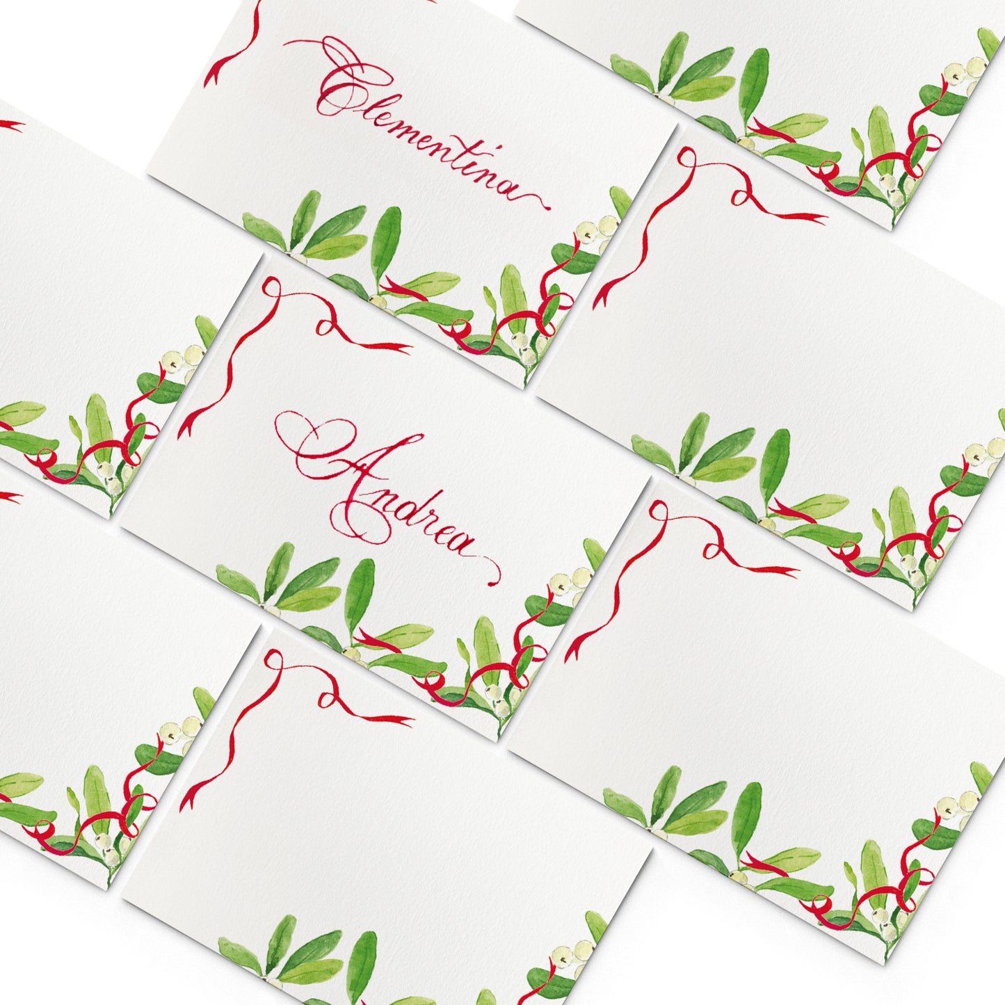 Image of multiple Clementina Sketchbook festive place cards, featuring Mistletoe hand-painted designs.