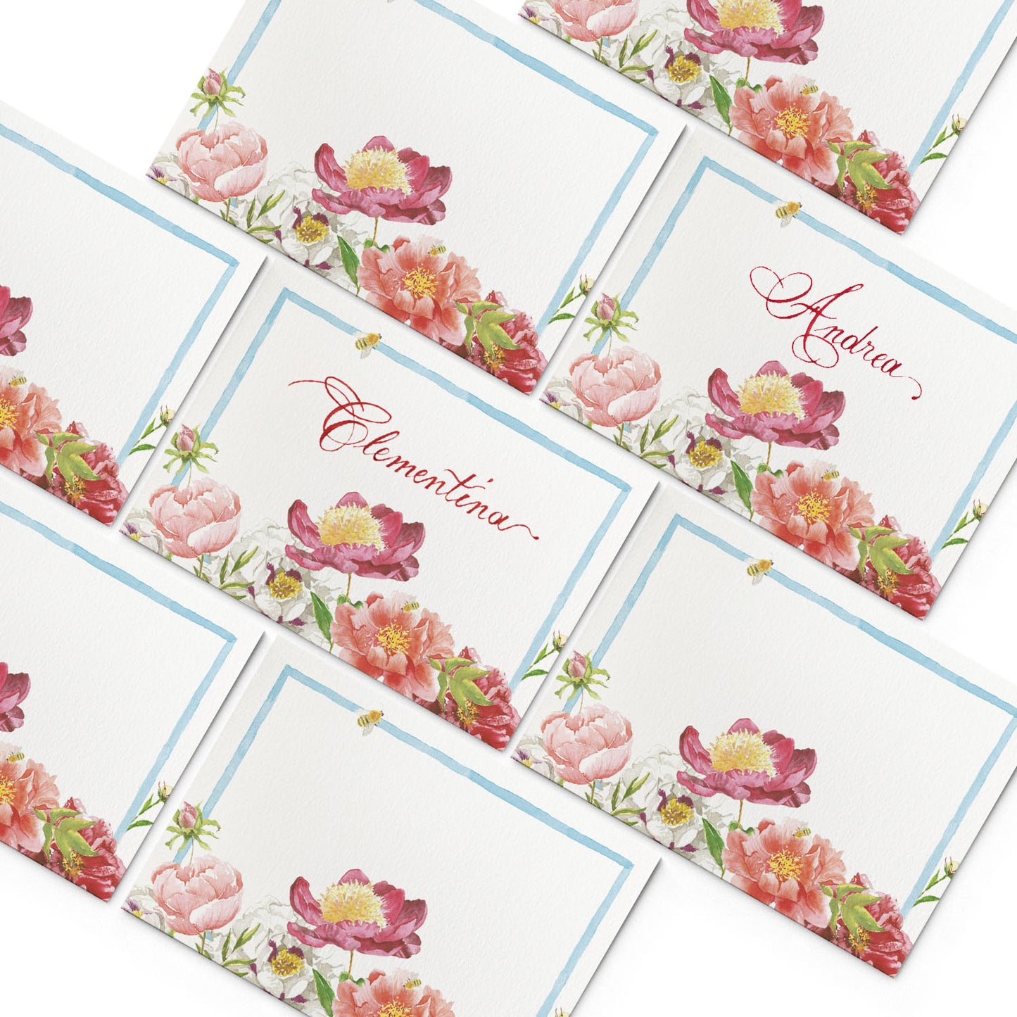 Image of multiple Clementina Sketchbook garden party place cards, featuring blue borders and hand-painted designs of peonies.