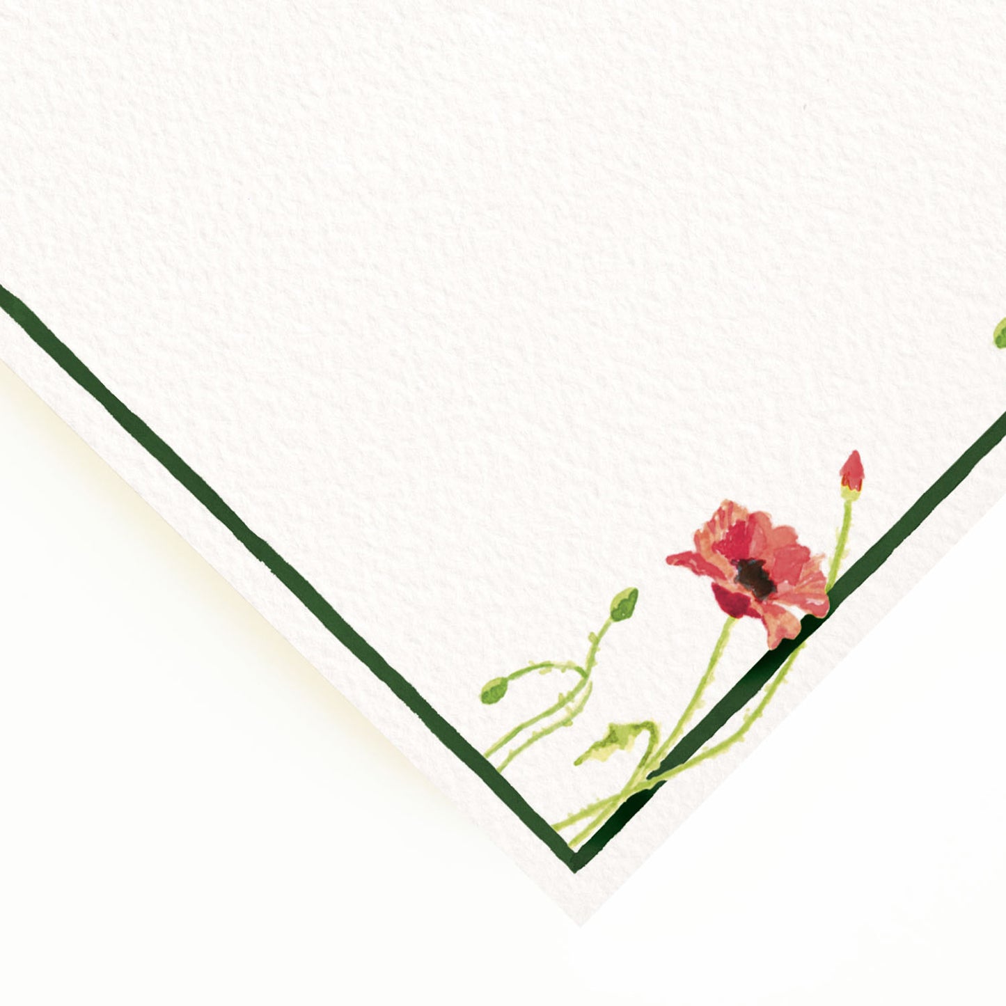 Close-up of the corner of our festive dinner menu, showcasing the menu's dark green border and hand-painted watercolour designs.