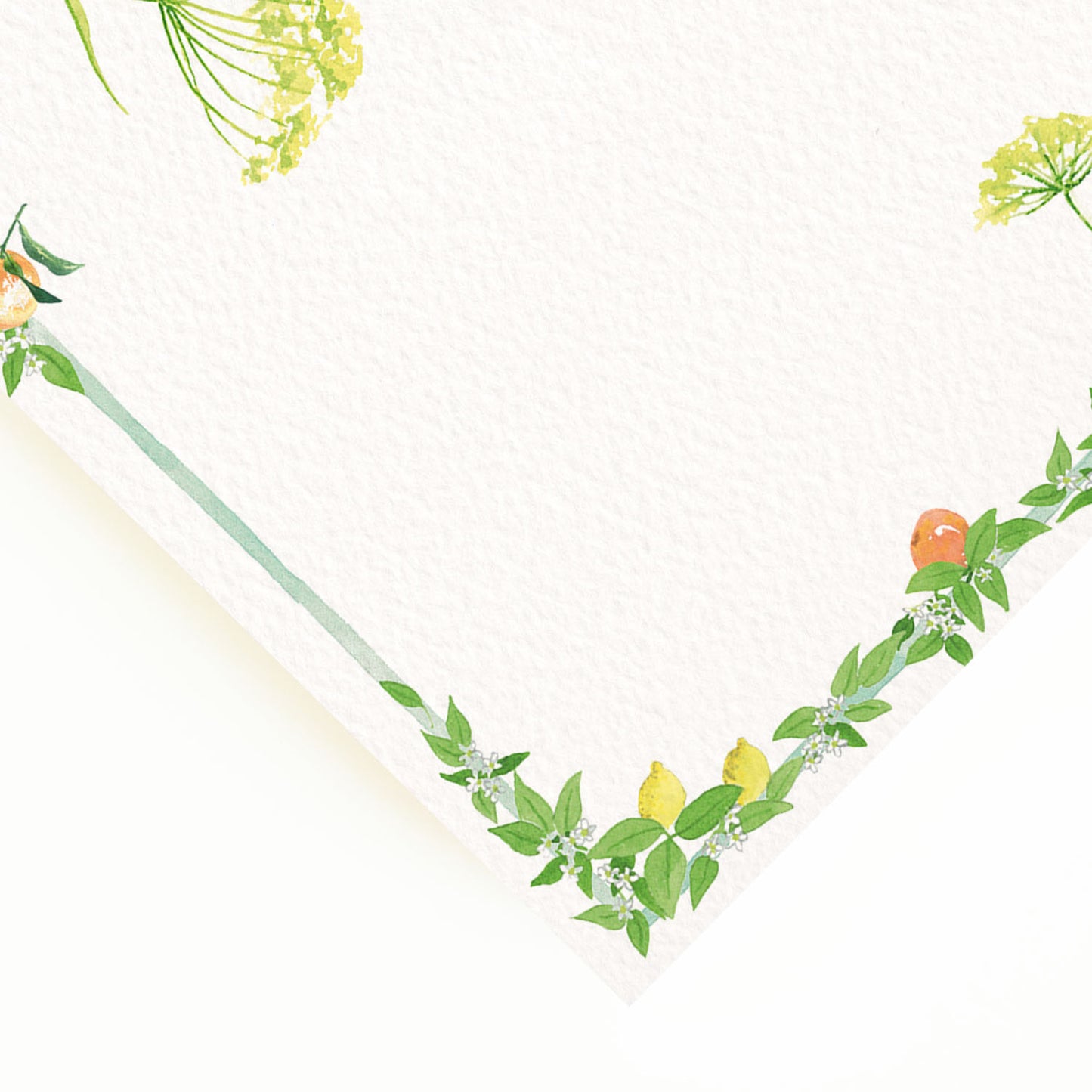 Close-up of the corner of our tuttifrutti menu, the perfect personalised wedding menu, showcasing the multicoloured citrus and floral detailing.