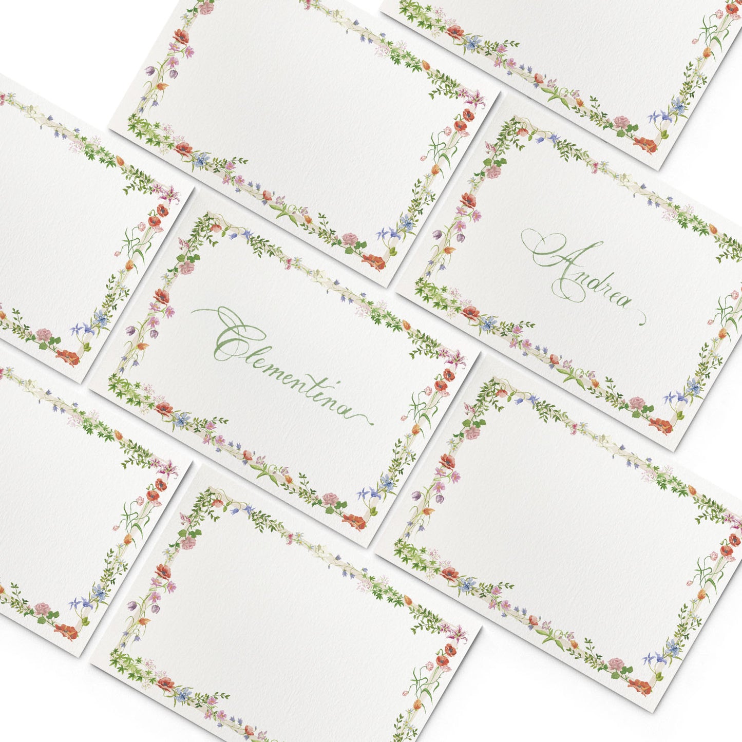 Image of multiple Clementina Sketchbook flower place cards, featuring wild bloom hand-painted designs.