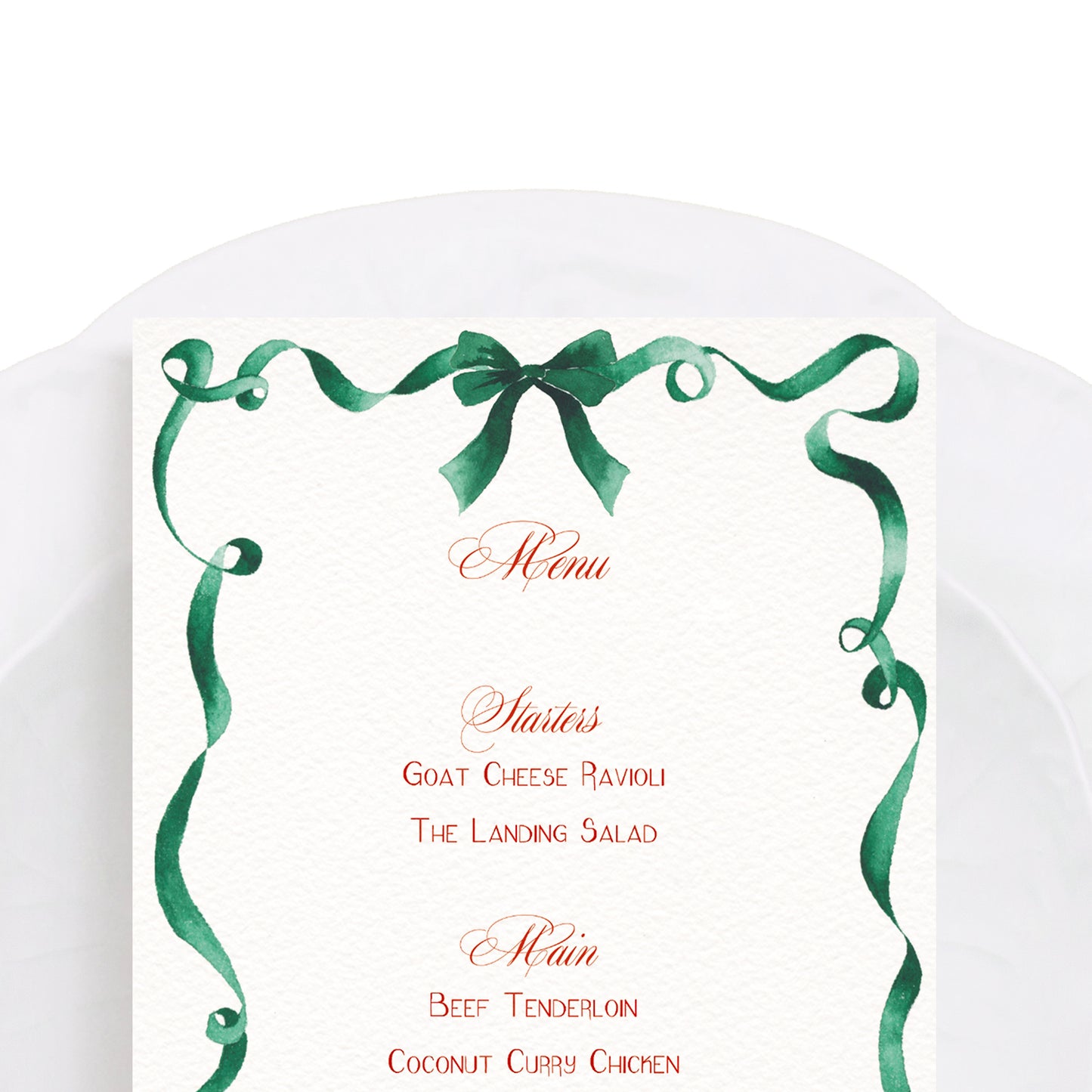 Close-up of our ribbon festive dinner menu, featuring personalised text and a curled green ribbon border - our hand-painted watercolour design.