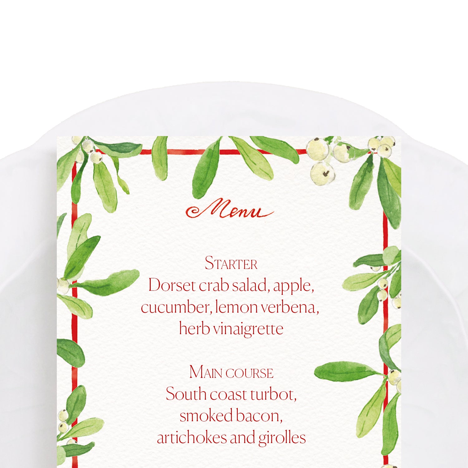 Close-up of our mistletoe holiday dinner menu, featuring personalised text, a our custom design of a red border covered with mistletoe.