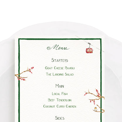 Close-up of our festive holiday menu, featuring a green border, winter berries and ski-lifts.