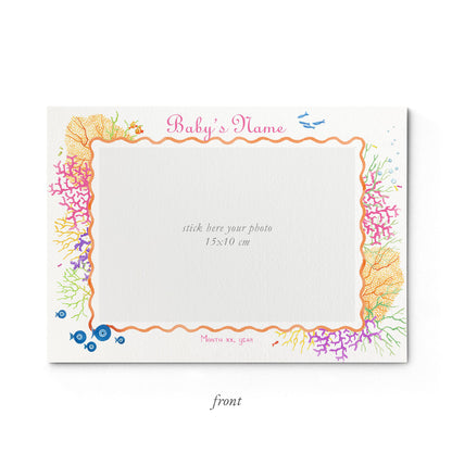 Image of the front of Clementina Sketchbook's coral reef printed birth announcement with a reef border and space for a baby photo to be stuck.