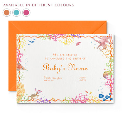 Image of Clementina Sketchbook's coral reef printed birth announcement, with a multicoloured coral border, orange personalised text and an orange envelope. In the corner of the image there is a colour wheel showing the different colours available for this personalised birth announcements: orange, pink and blue.