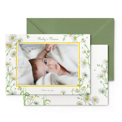 Image of both sides of Clementina Sketchbook's daisies printed birth announcement with a floral yellow border, personalised text, space for a baby photo to be stuck and a green envelope.