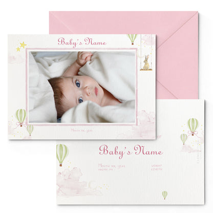 Image of both sides of Clementina Sketchbook's hot air balloon printed birth announcement with a pink border, personalised text, space for a baby photo to be stuck and a pink envelope.