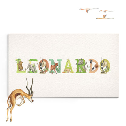 Close-up of the african animals print, which spells out the name 'Leonardo'. Each letter has a unique watercolour design.