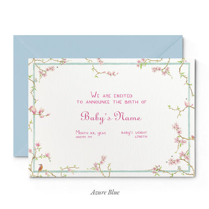 Image of Clementina Sketchbook's magnolia printed birth announcement with a pale blue and floral border, personalised text and pale blue envelope.