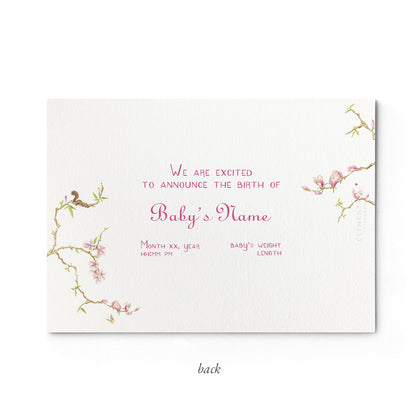 Image of the back of Clementina Sketchbook's magnolia printed birth announcement with a floral border and space for personalised text.