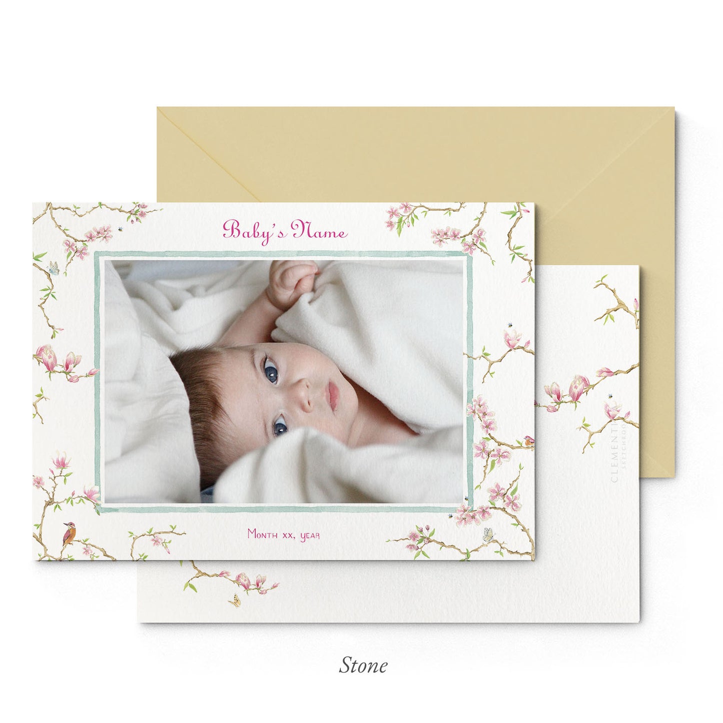 Image of both sides of Clementina Sketchbook's magnolia printed birth announcement with a floral border, personalised text, space for a baby photo to be stuck and a sand envelope.