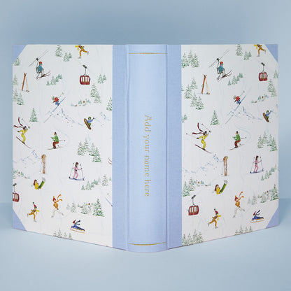 Detail of Mountain Activities album corner showing fabric binding and hand-painted alpine artwork, personalised family photo album.