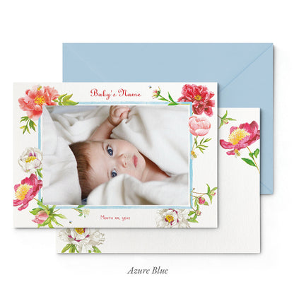 Image of both sides of Clementina Sketchbook's peonies printed birth announcement with a floral border, personalised text, space for a baby photo to be stuck and a blue envelope.