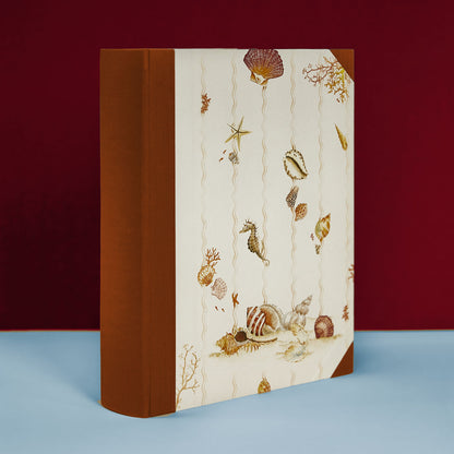Shells on Shells Photo Album with brown binding, seaside-inspired design, perfect as a personalised holiday photo album.