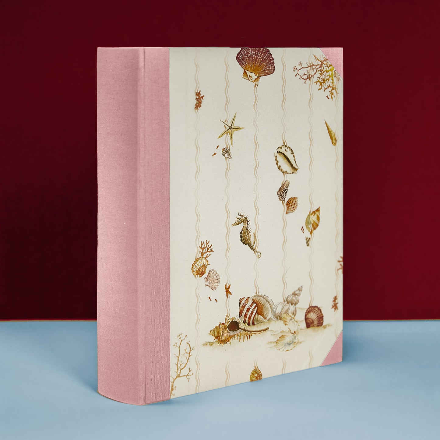 Light pink Shells on Shells personalised photo album with seashell cover design, perfect as a wedding or family photo album.