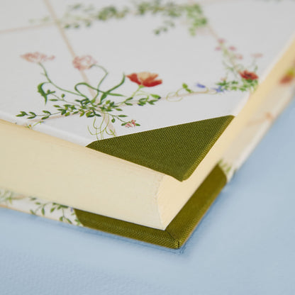 Green Wild Blooms personalised photo album with gold foiling option on the spine, elegant floral memory book handmade in Italy.