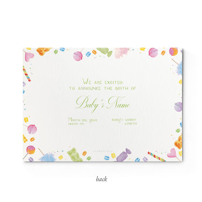 Image of the back of Clementina Sketchbook's candy printed birth announcement with a multicoloured candy border and space for personalised text.