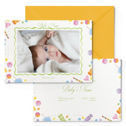 Image of both the front and back of Clementina Sketchbook's candy printed birth announcement with a photo of a baby on the front, a multicoloured candy border, personalised text and a yellow envelope.