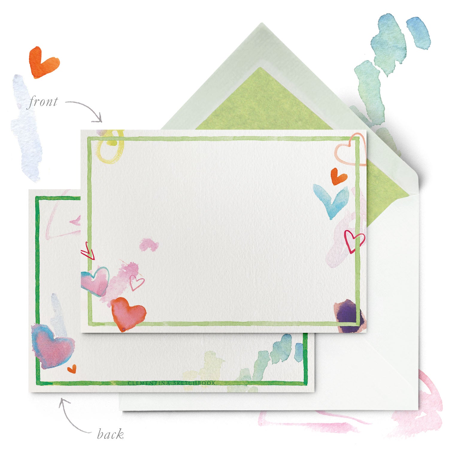 Close-up of a Clementina Sketchbook children's stationery card, with a heart watercolour design, a light green border and a green tissue envelope.